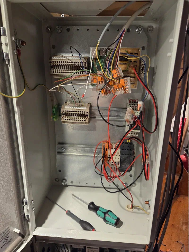 Inside the almost empty alarm cabinet