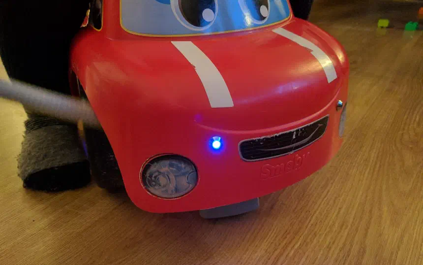 Mounting blue emergency LEDs on kids' walking car