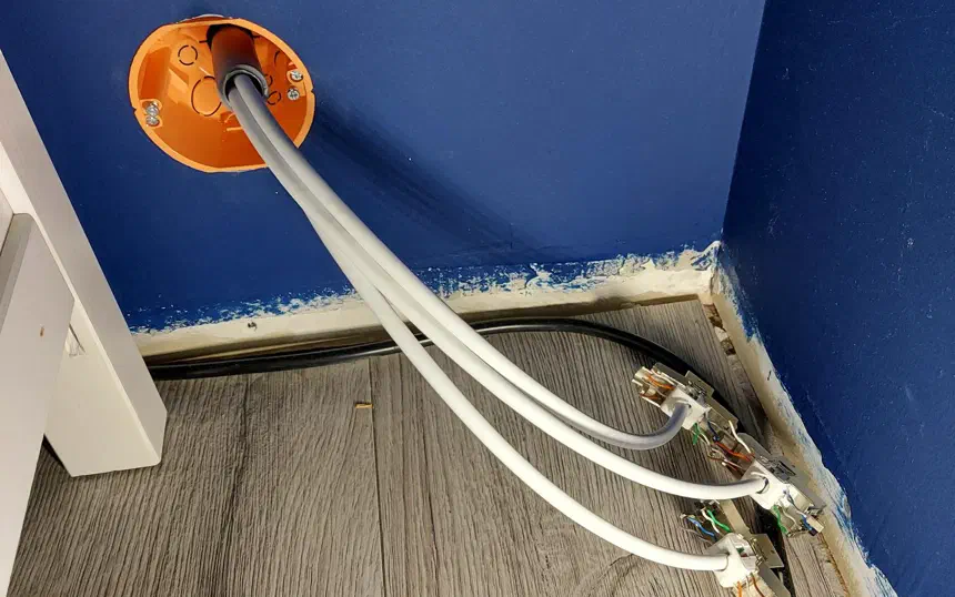 Running three CAT6 cables to the living room TV bench