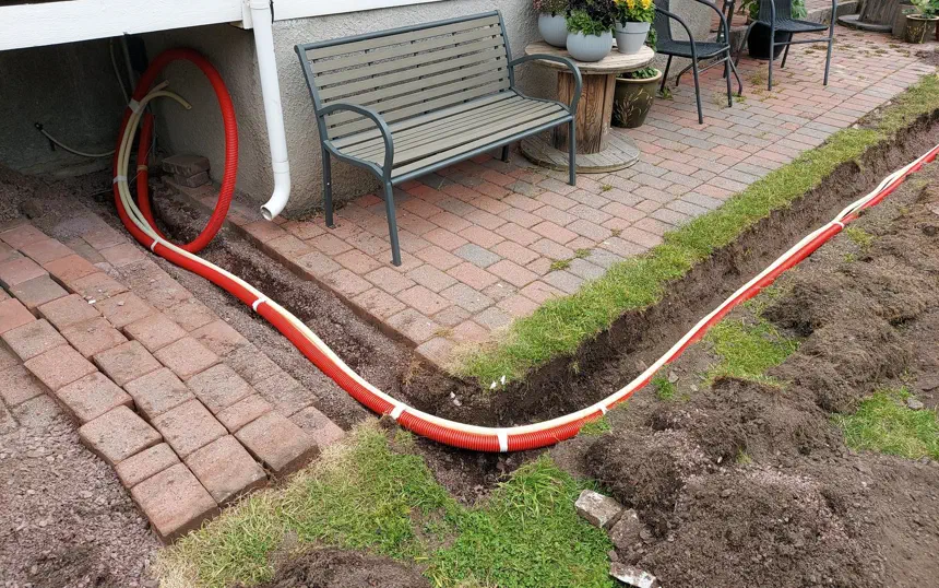 Underground conduits to garage and shed